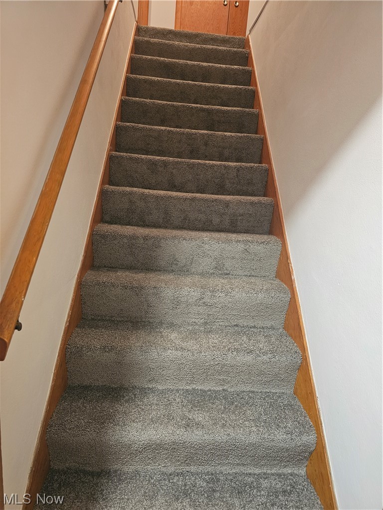 3700 Jaeger Road Lorain, OH 44053 - Photo 33 of 50 Staircase with hardwood / wood-style floors