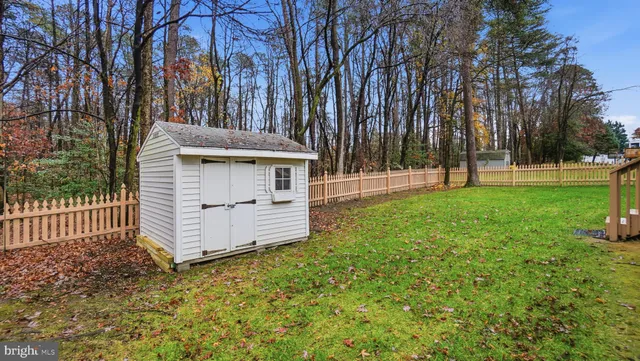 a view of backyard with green space