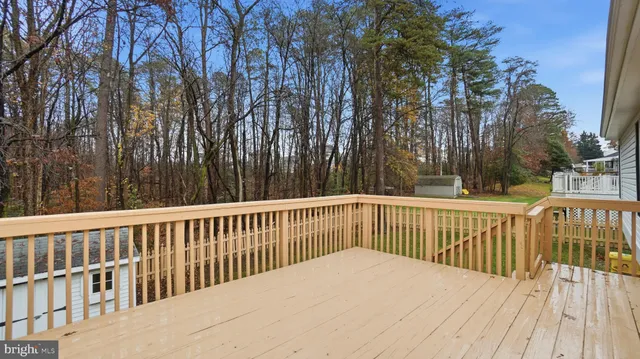 a view of a wooden roof deck