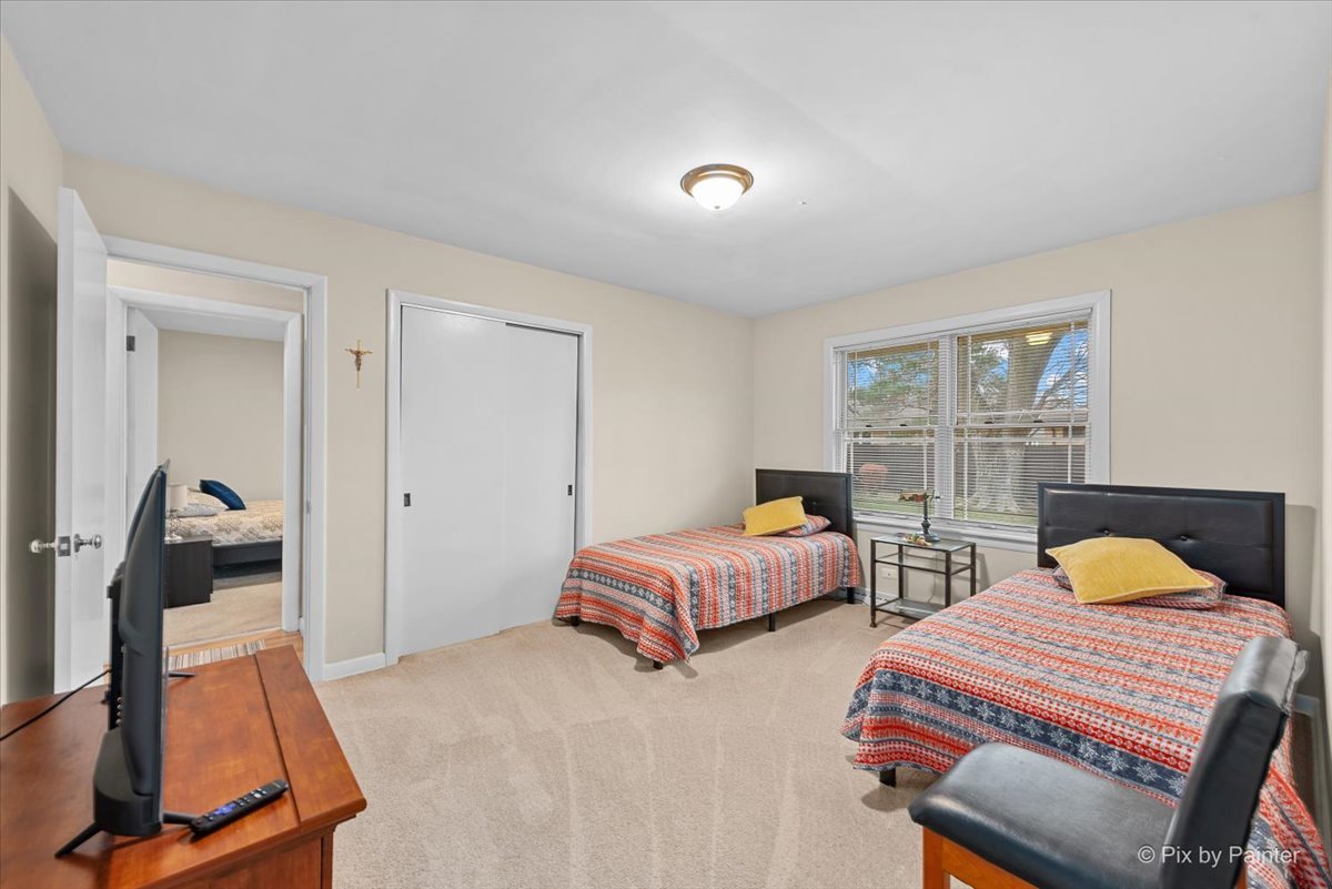 431 North Melrose Avenue Elgin, IL 60123 - Photo 11 of 32 a bedroom with two beds and painted walls