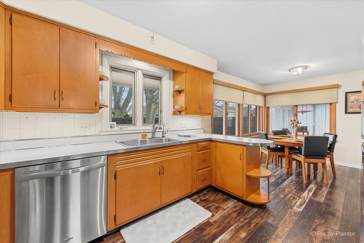 431 North Melrose Avenue Elgin, IL 60123 - Photo 12 of 32 a kitchen with a sink and cabinets