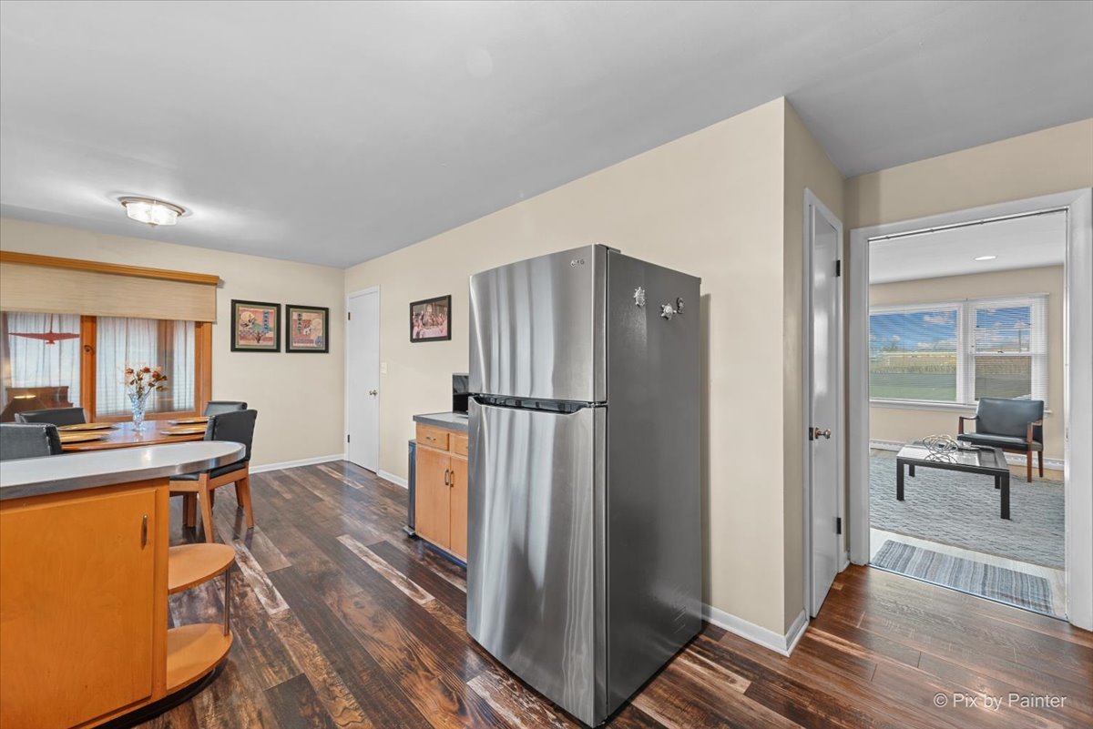 431 North Melrose Avenue Elgin, IL 60123 - Photo 13 of 32 a kitchen with stainless steel appliances granite countertop a refrigerator and a stove top oven