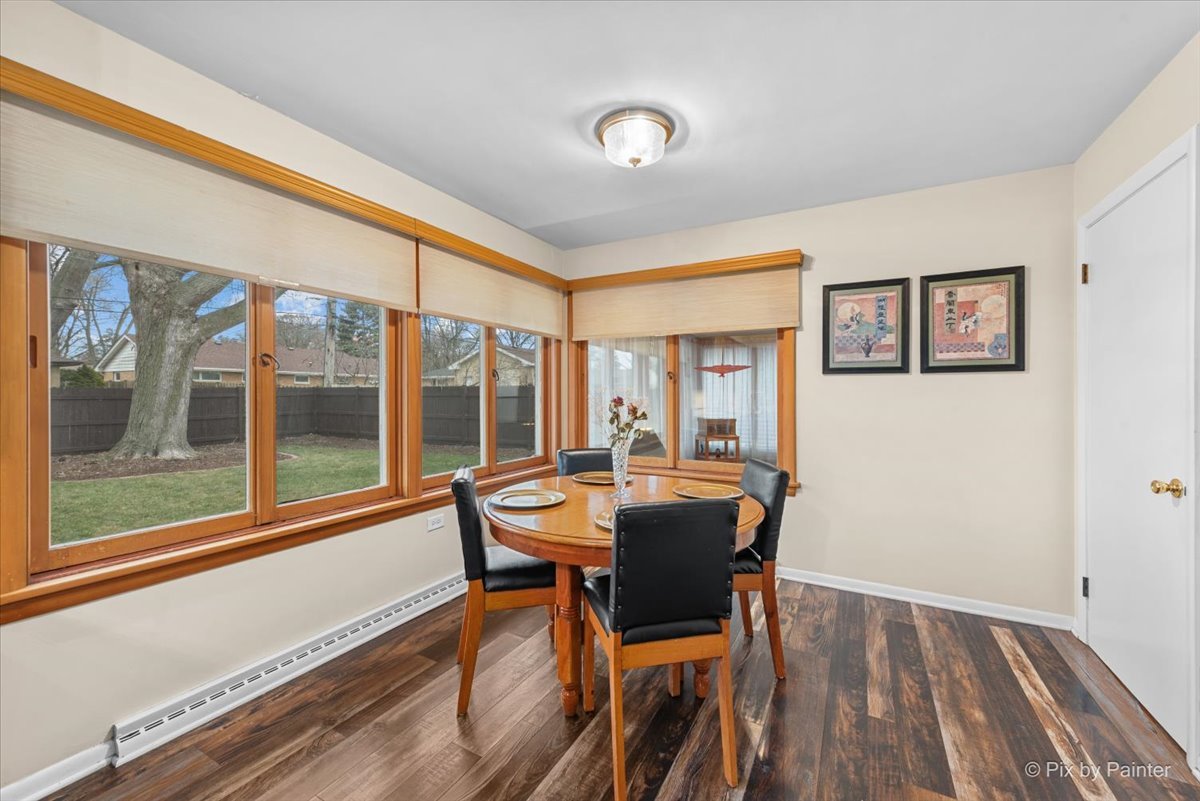431 North Melrose Avenue Elgin, IL 60123 - Photo 15 of 32 a dining room with furniture and wooden floor