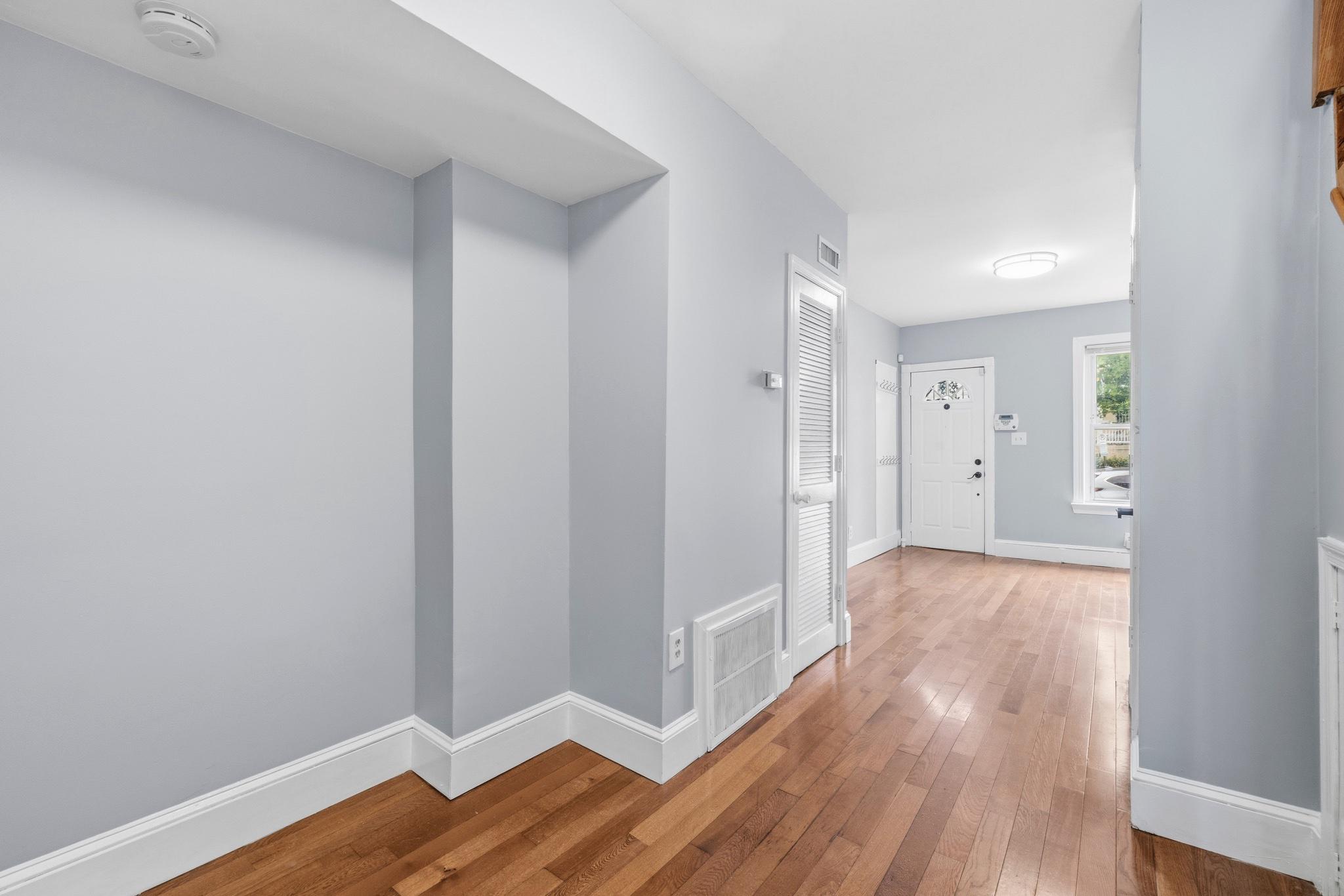 925 8th Street Northeast Washington, DC 20002 - Photo 13 of 24 a view of a hallway with wooden floor