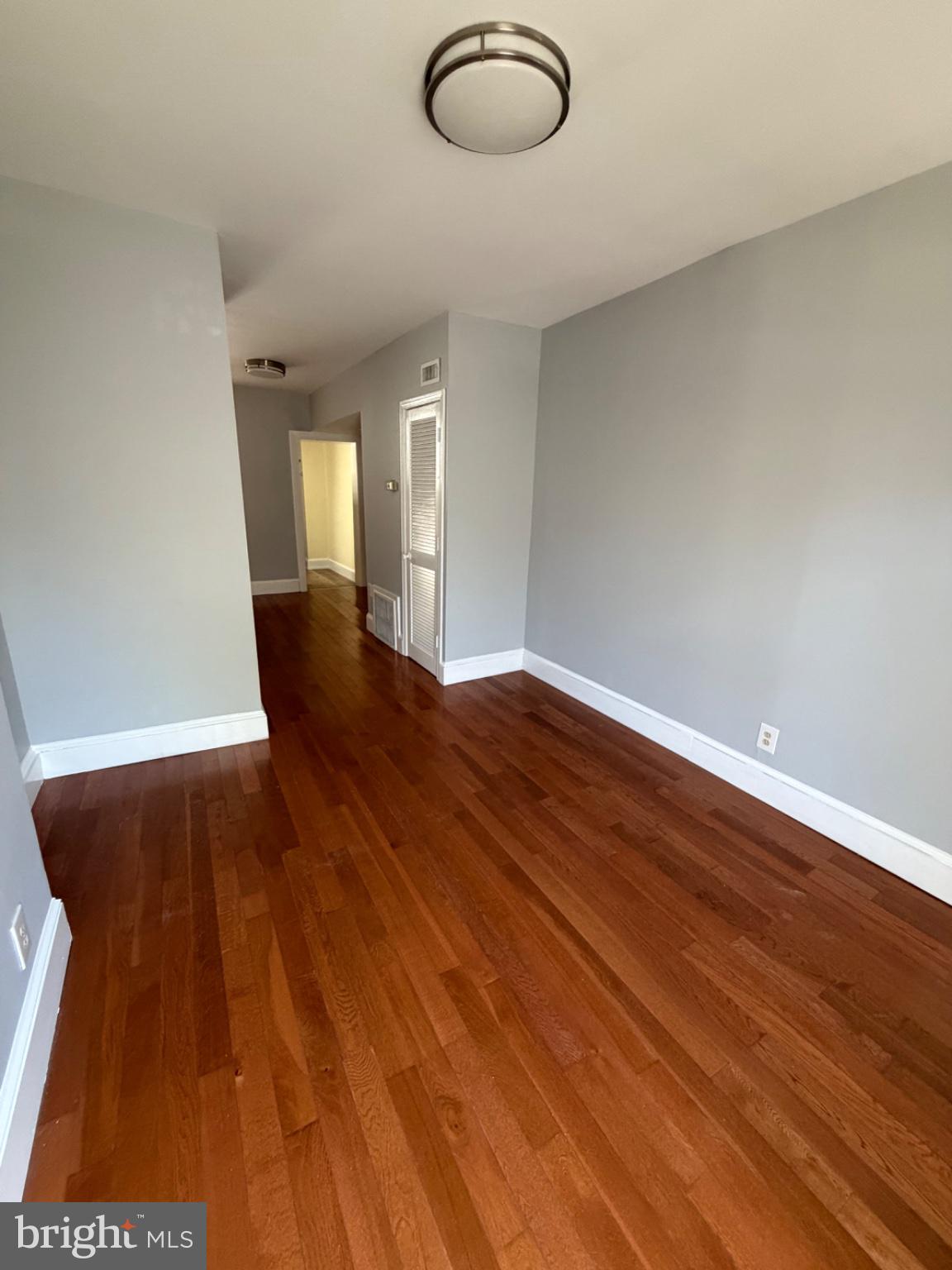 925 8th Street Northeast Washington, DC 20002 - Photo 2 of 6 Spacious entryway with warm wood floors.