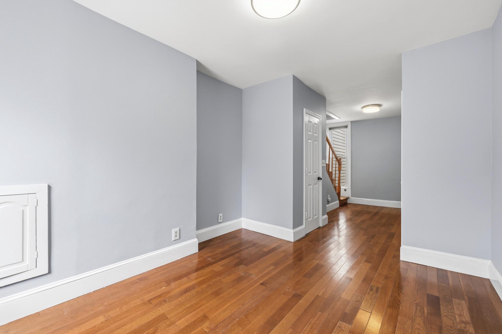 925 8th Street Northeast Washington, DC 20002 - Photo 7 of 24 a view of a hallway with wooden floor