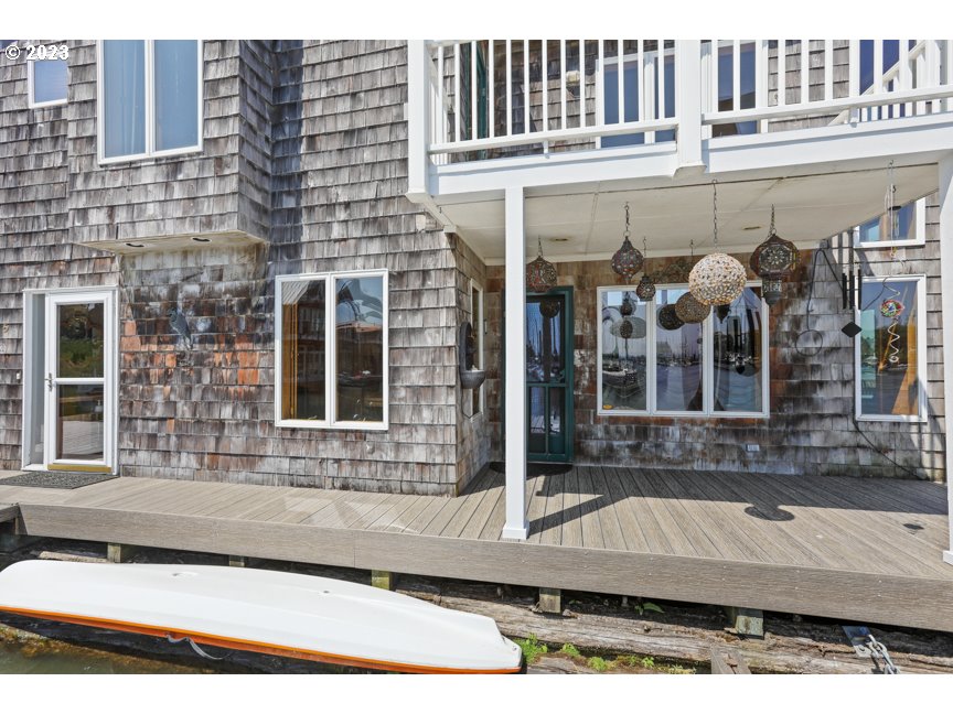111 North Bridgeton Road, Unit E05 Portland, OR 97217 - Photo 11 of 42 a view of a brick building with large windows