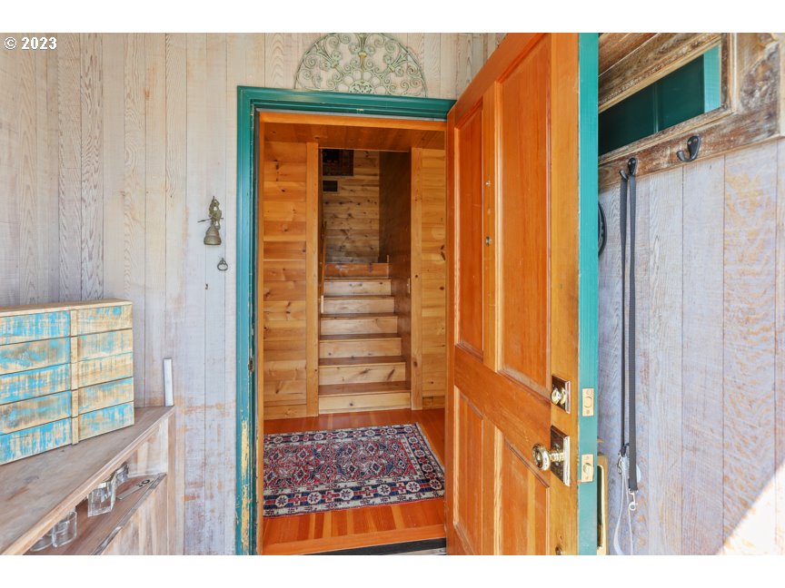111 North Bridgeton Road, Unit E05 Portland, OR 97217 - Photo 12 of 42 a view of a door and wooden floor