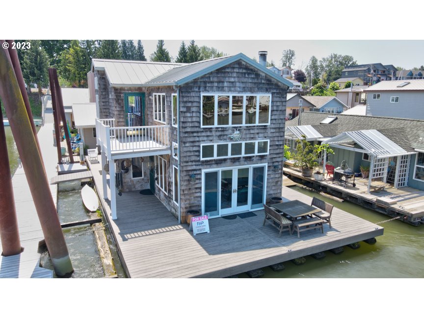 111 North Bridgeton Road, Unit E05 Portland, OR 97217 - Photo 5 of 42 a aerial view of a house with a swimming pool