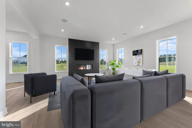 a spacious bathroom with a double vanity sink and mirror