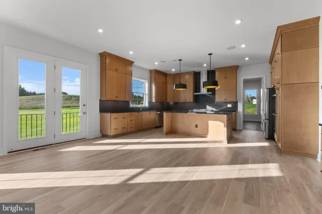 a bathroom with a bathtub and a toilet