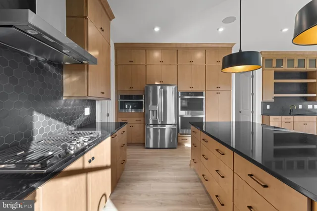 a view of an empty room and closet area