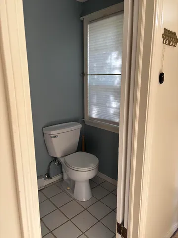 a bathroom with a toilet