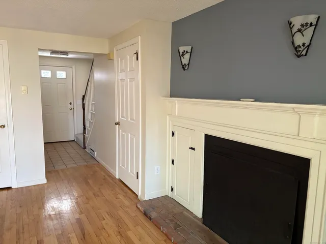 a view of a livingroom with wooden floor