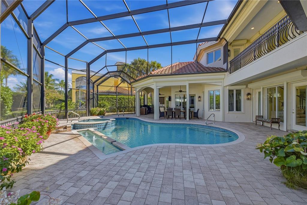 355 Sedgwick Court Naples, FL 34108 - Photo 37 of 48 a view of a house with a swimming pool