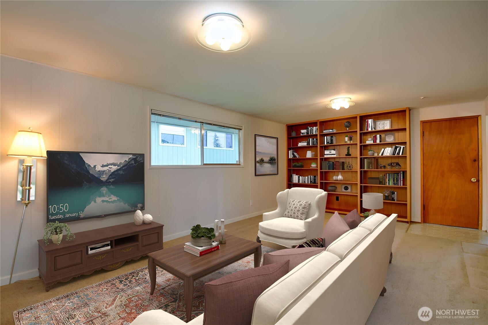 5121 West Highland Road Everett, WA 98203 - Photo 13 of 36 a living room with furniture and a flat screen tv
