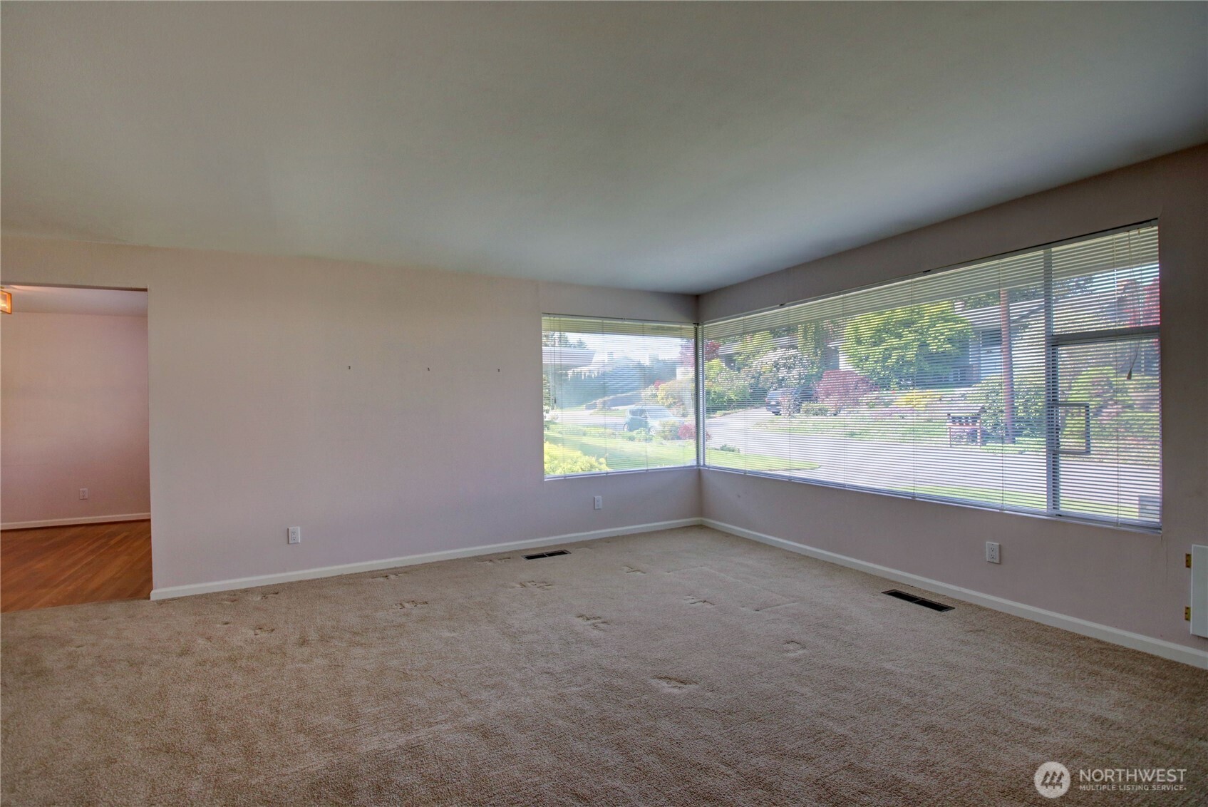 5121 West Highland Road Everett, WA 98203 - Photo 5 of 36 an empty room with windows