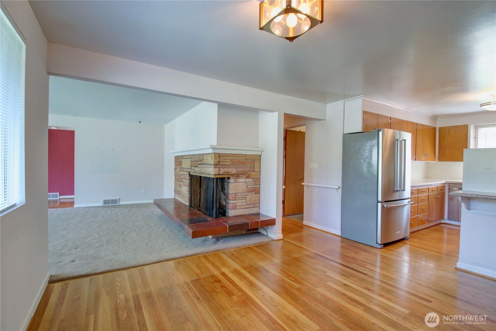 5121 West Highland Road Everett, WA 98203 - Photo 9 of 36 a view of a livingroom with furniture a fireplace