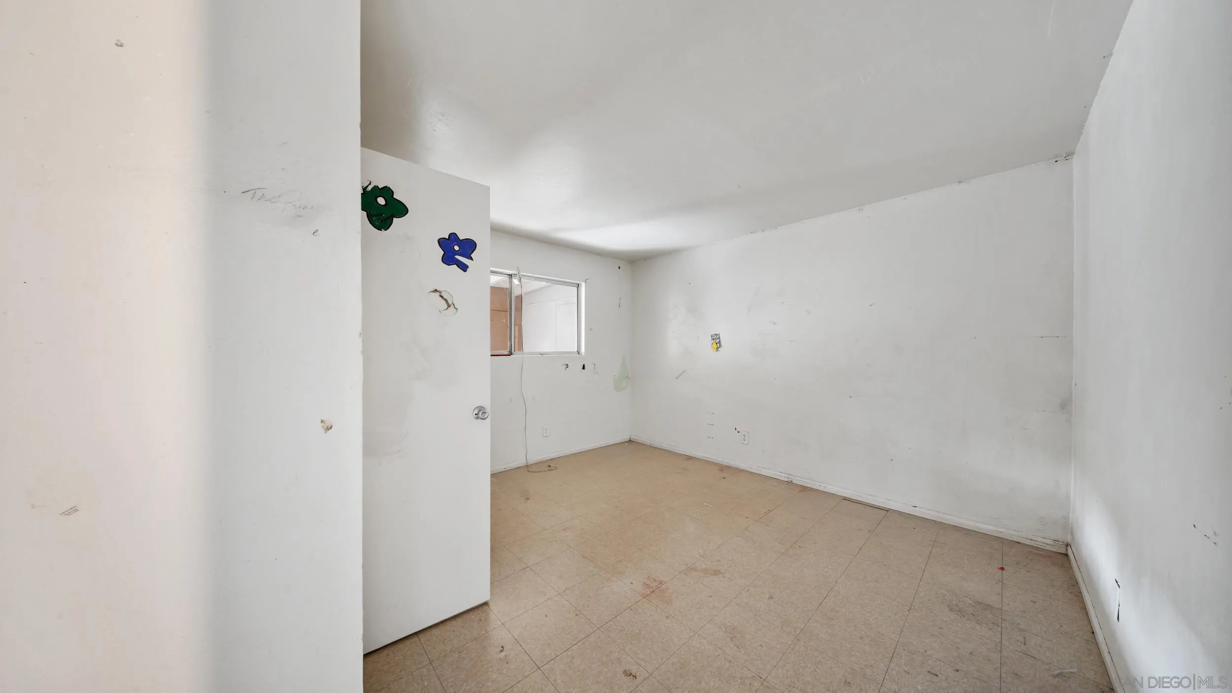 2839 Emerald Drive Oceanside, CA 92056 - Photo 17 of 32 an empty room with closet and windows