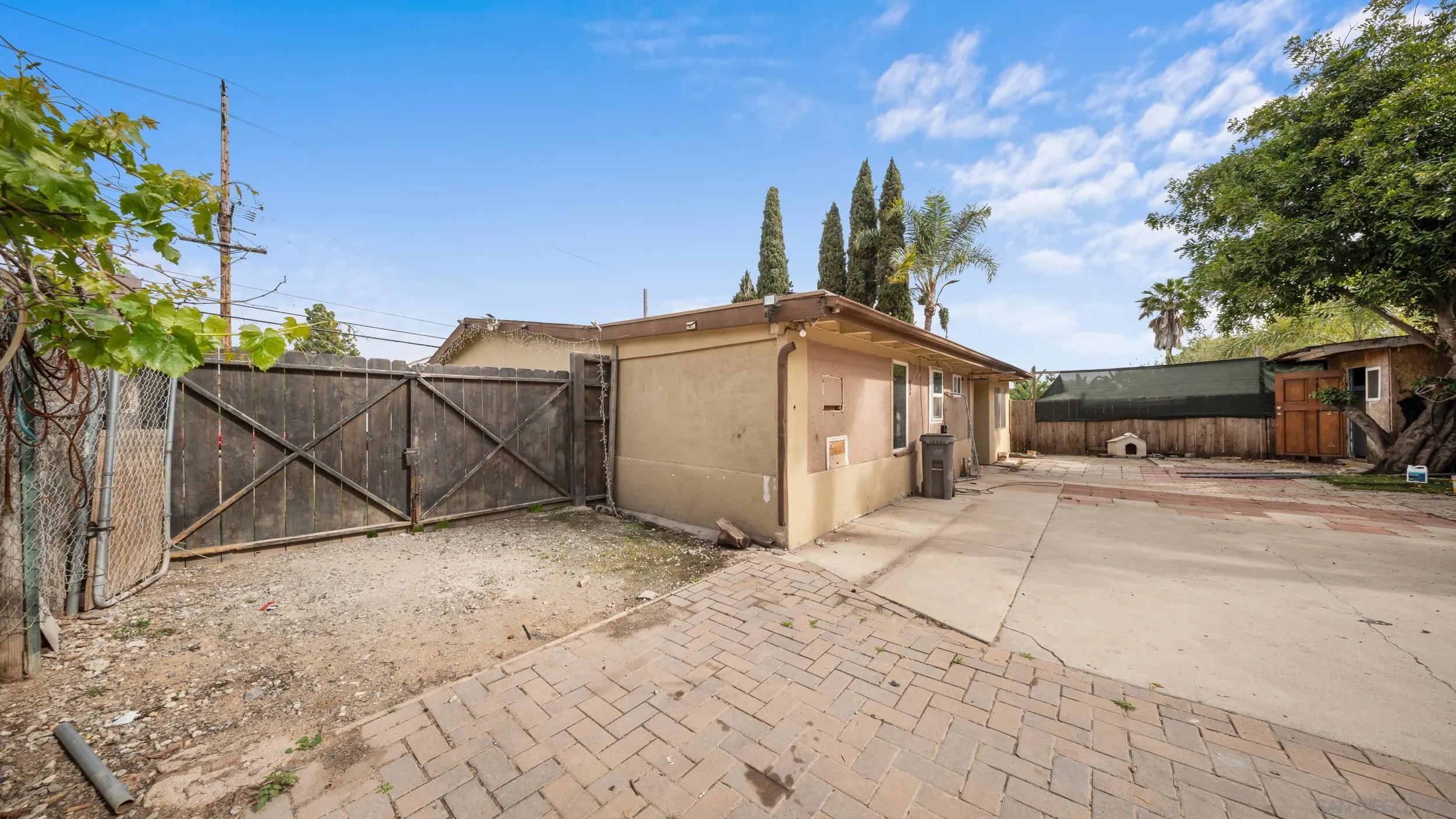 2839 Emerald Drive Oceanside, CA 92056 - Photo 28 of 32 a front view of a house with a yard and garage