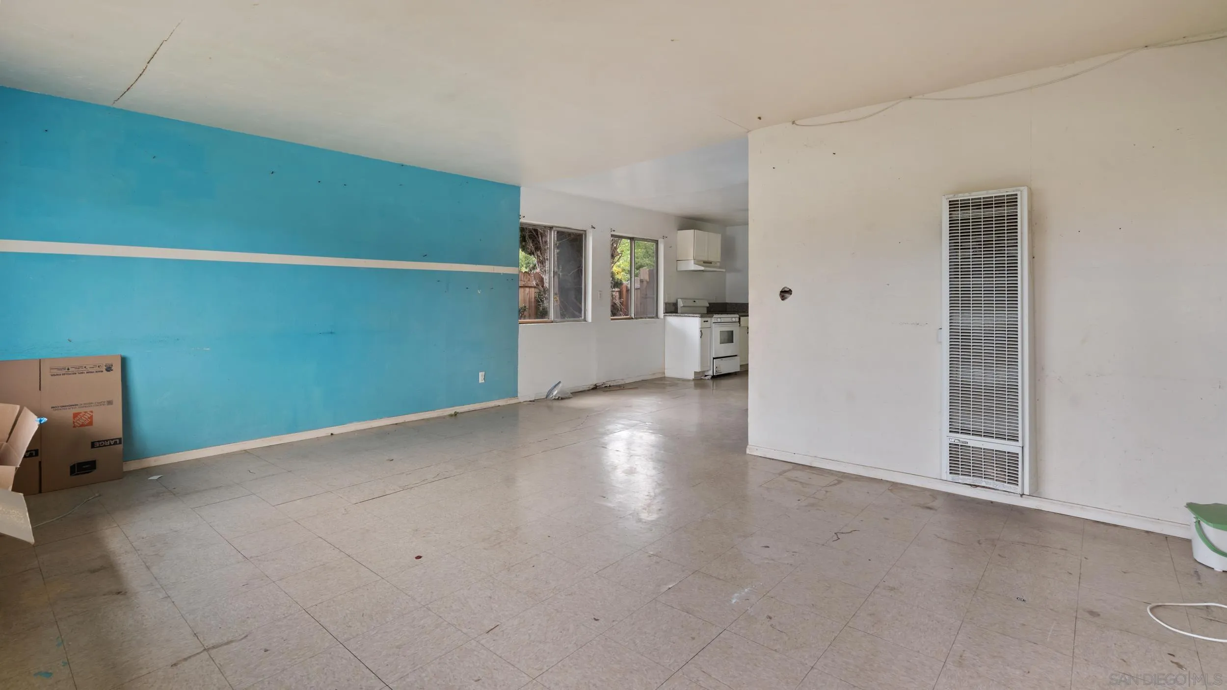 2839 Emerald Drive Oceanside, CA 92056 - Photo 3 of 32 a view of empty room with stairs and a window