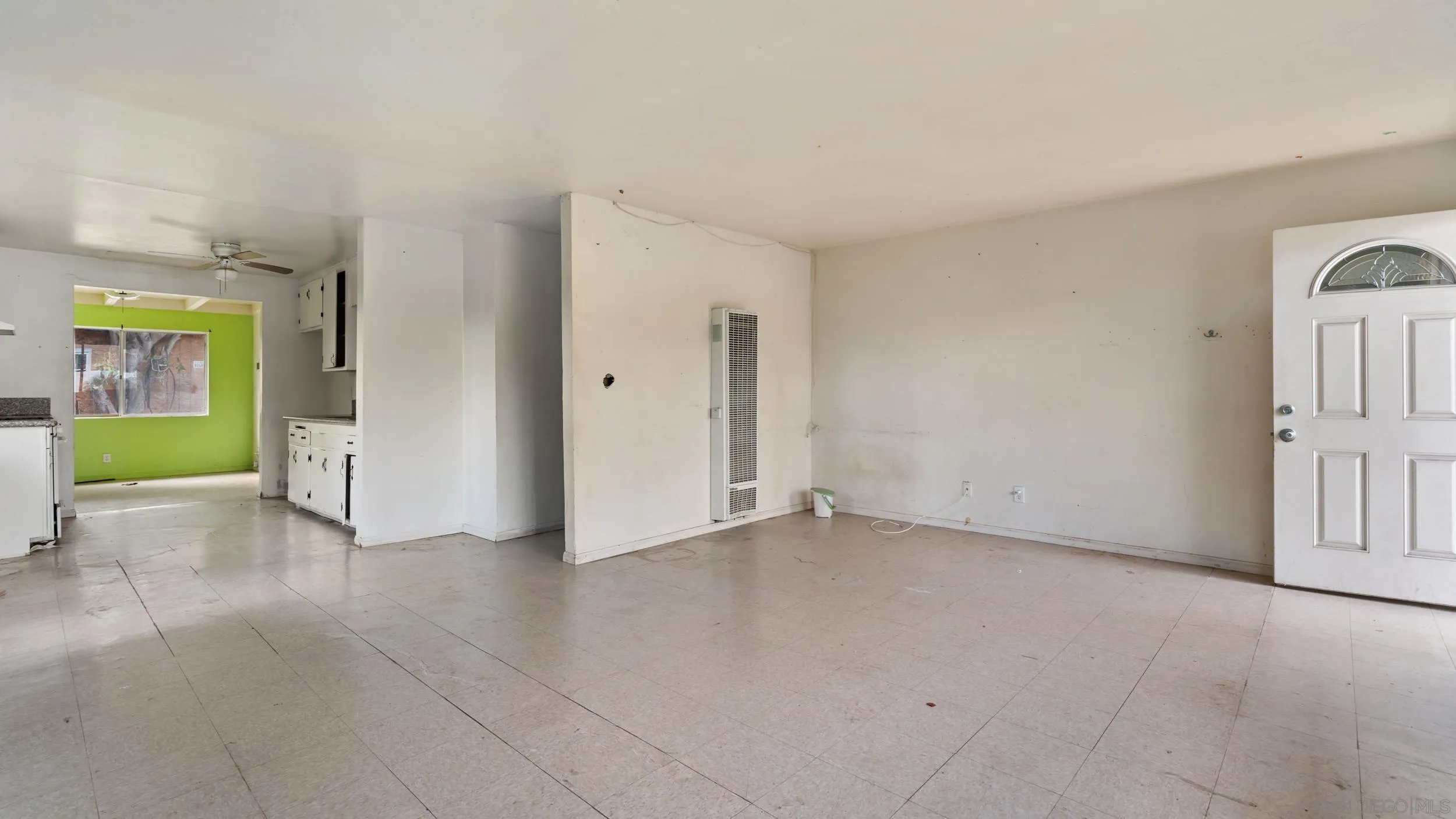 2839 Emerald Drive Oceanside, CA 92056 - Photo 4 of 32 a view of an empty room with a window