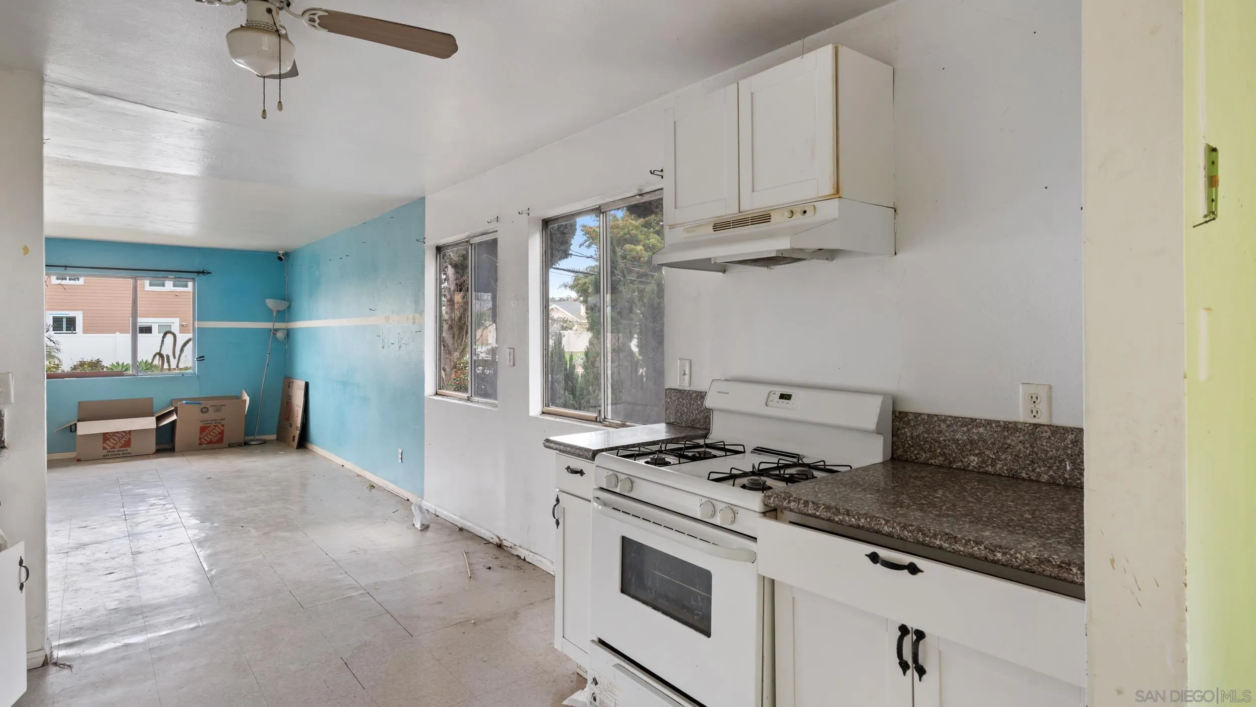 2839 Emerald Drive Oceanside, CA 92056 - Photo 9 of 32 a kitchen with stainless steel appliances granite countertop a stove and a refrigerator