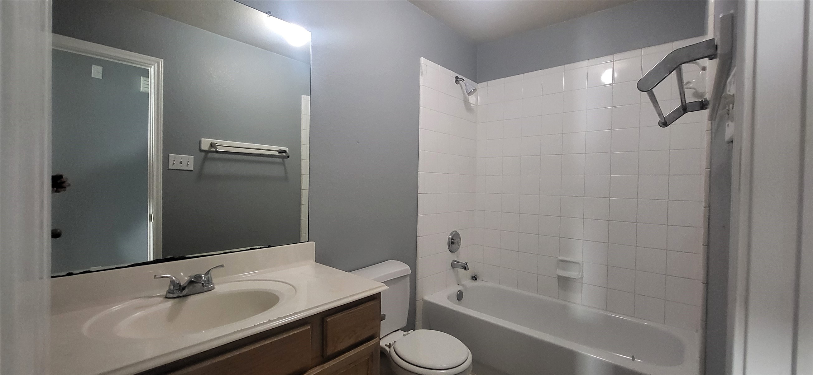 24022 Rockygate Drive Spring, TX 77373 - Photo 8 of 12 a bathroom with a sink toilet and shower