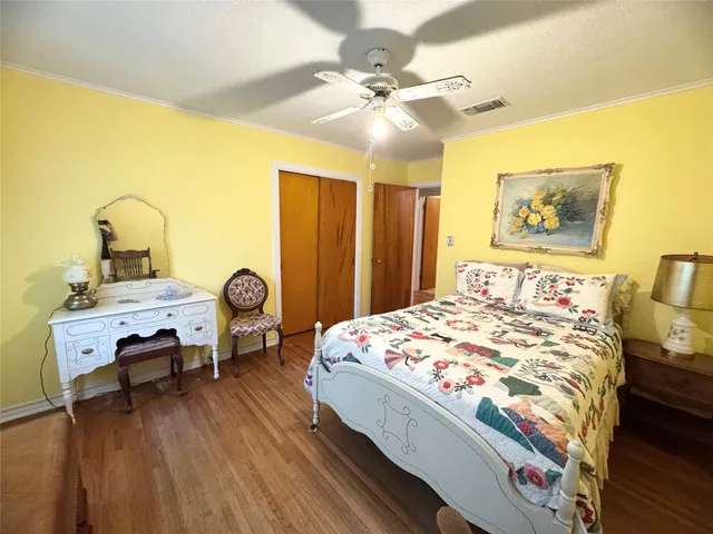 a bathroom with a sink toilet and a mirror
