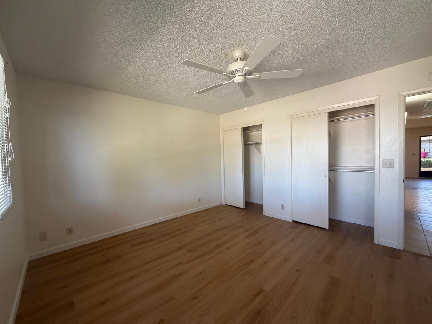 520 South Greenfield Road, Unit 41 Mesa, AZ 85206 - Photo 14 of 24 a view of an empty room and wooden floor