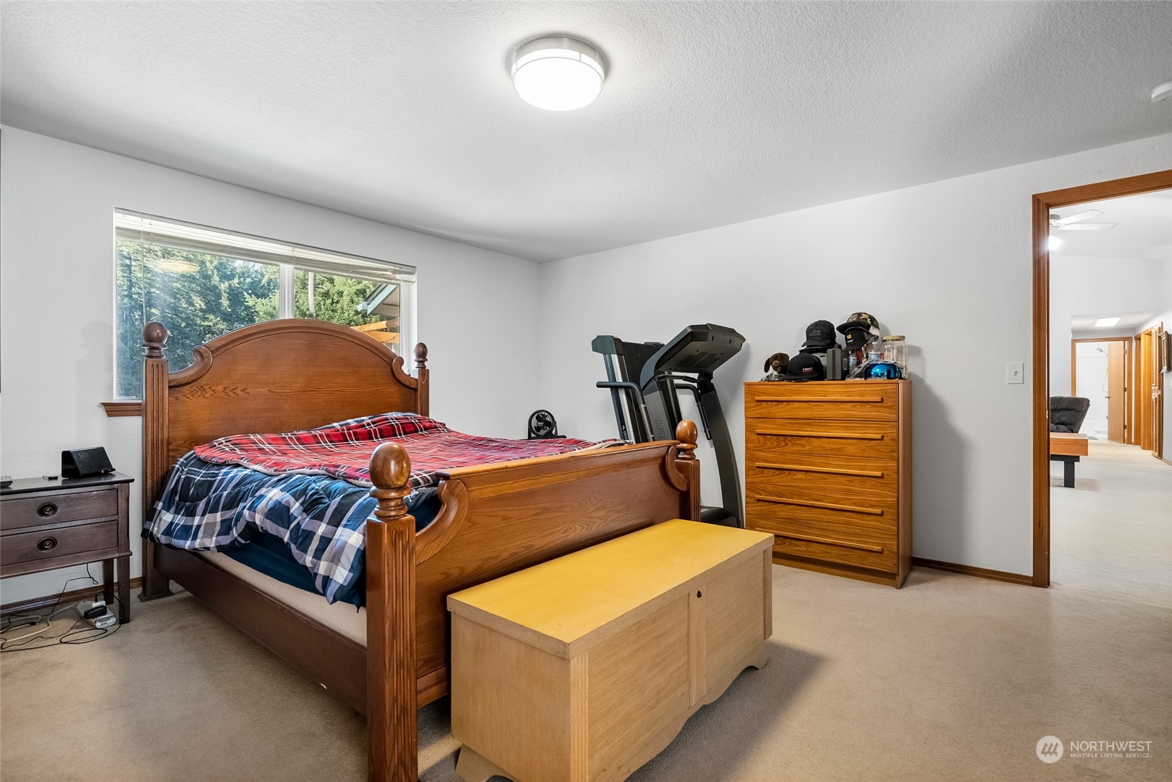 5520 133rd Avenue Southwest Rochester, WA 98579 - Photo 23 of 40 a bedroom with furniture and a window