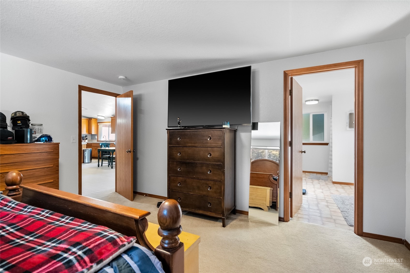 5520 133rd Avenue Southwest Rochester, WA 98579 - Photo 24 of 40 a bedroom with a bed and a television