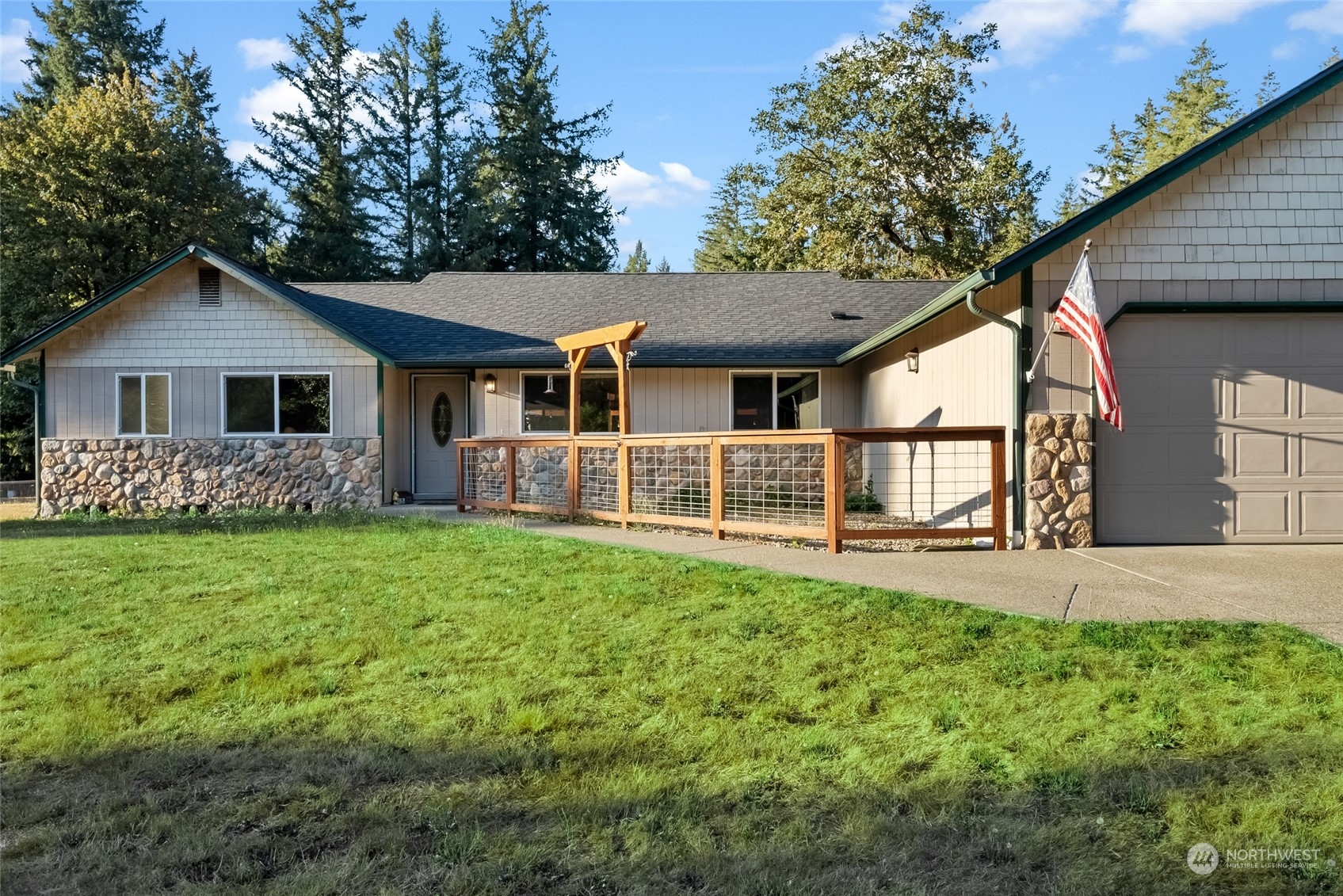 5520 133rd Avenue Southwest Rochester, WA 98579 - Photo 8 of 40 a front view of house with yard and green space