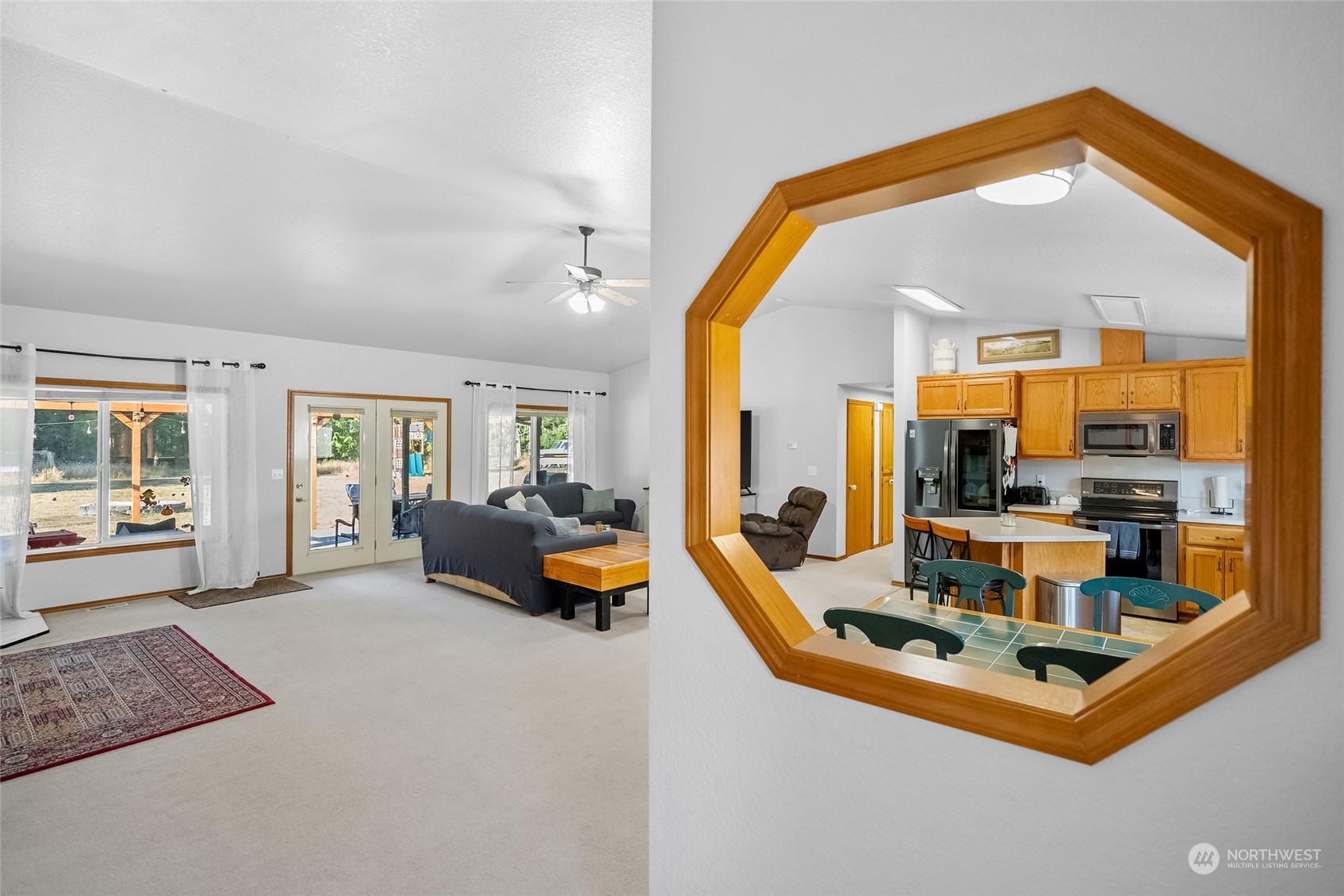 5520 133rd Avenue Southwest Rochester, WA 98579 - Photo 10 of 40 a view of living room with furniture and floor to ceiling window