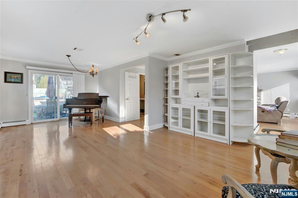 683 Eastern Court Ridgewood, NJ 07450 - Photo 14 of 25 a view of a livingroom with furniture and wooden floor