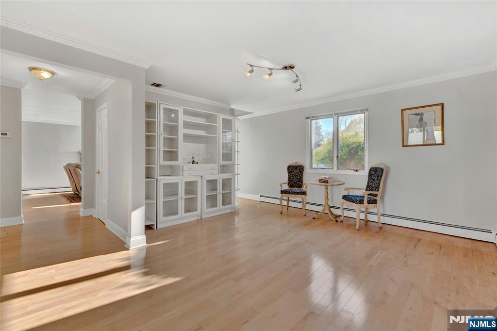 683 Eastern Court Ridgewood, NJ 07450 - Photo 15 of 25 a view of a livingroom with workspace and a window