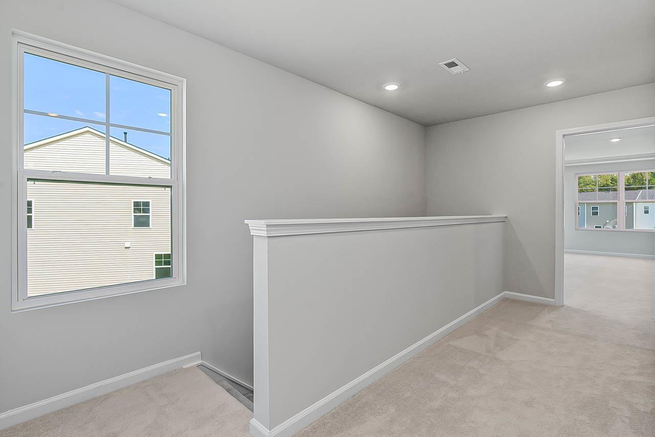 2421 Chert Lane Raleigh, NC 27610 - Photo 27 of 97 an empty room with windows and closet