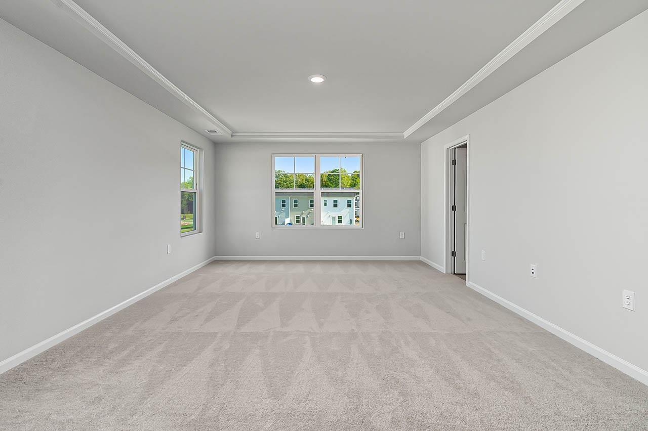 2421 Chert Lane Raleigh, NC 27610 - Photo 28 of 97 an empty room with windows