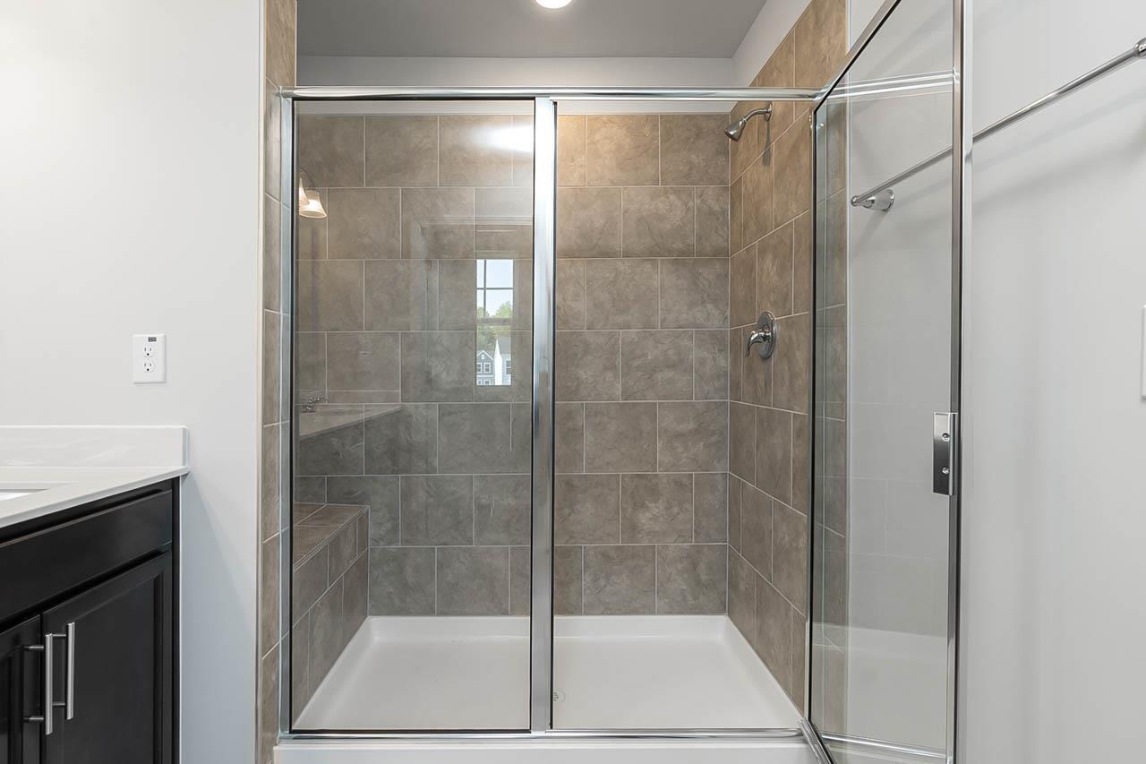 2421 Chert Lane Raleigh, NC 27610 - Photo 33 of 97 a bathroom with a shower