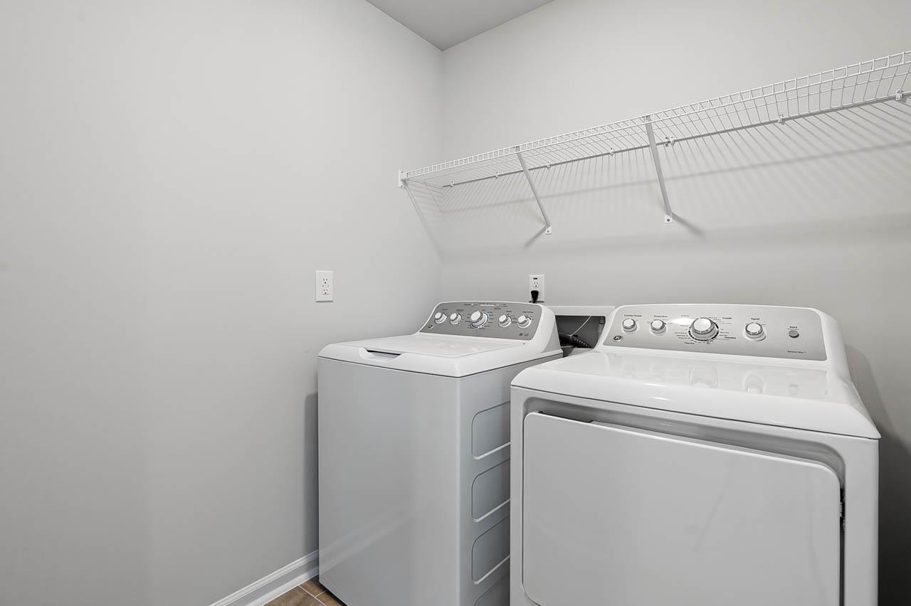 2421 Chert Lane Raleigh, NC 27610 - Photo 34 of 97 a utility room with dryer and washer
