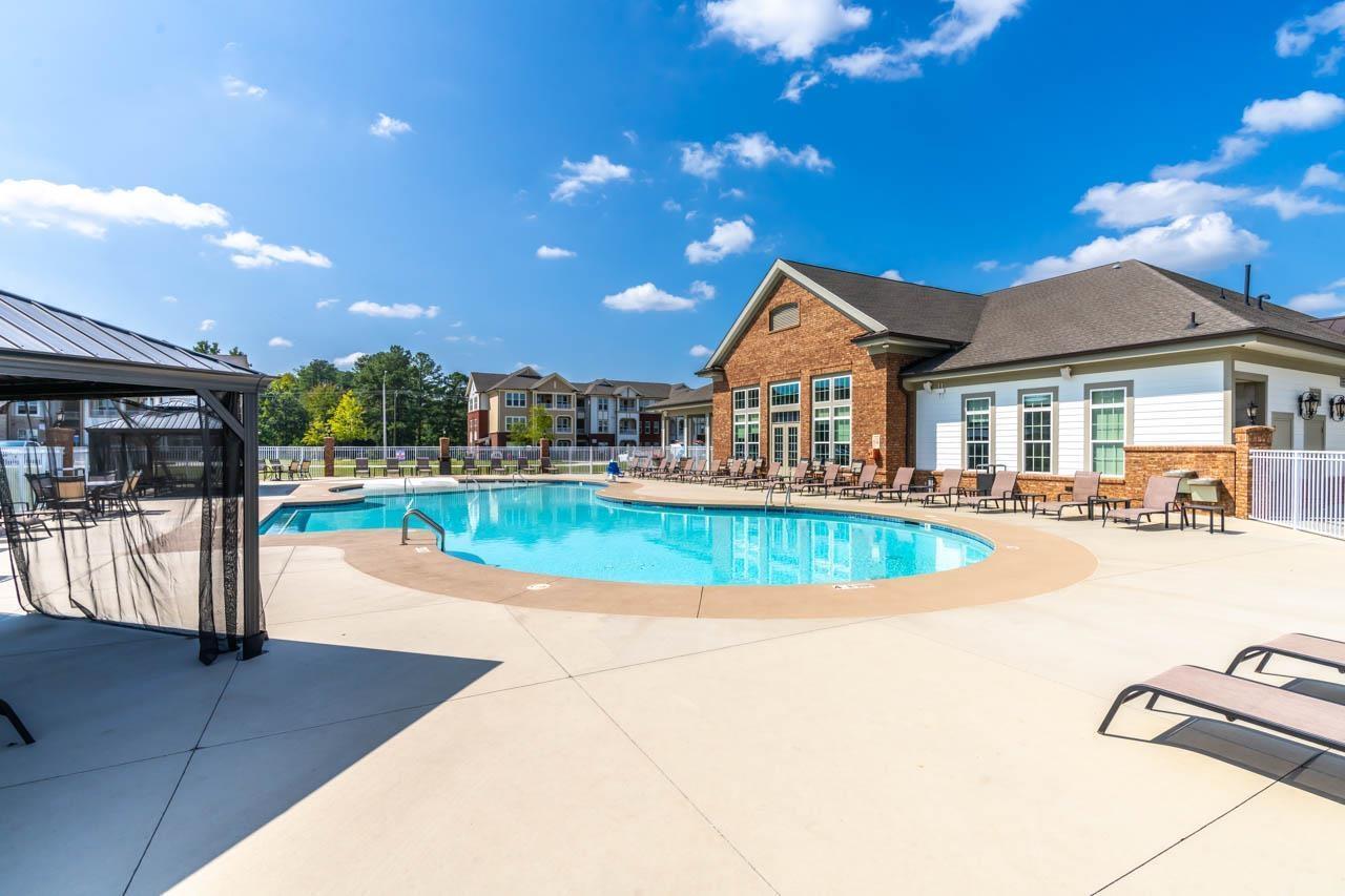 2421 Chert Lane Raleigh, NC 27610 - Photo 45 of 97 a view of a house with swimming pool and sitting area