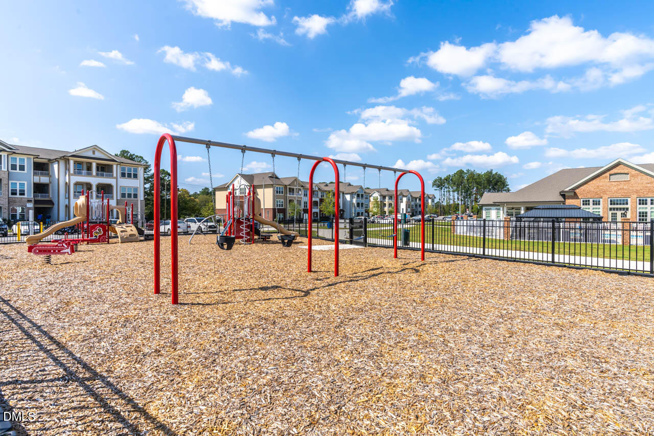 2421 Chert Lane Raleigh, NC 27610 - Photo 50 of 97 a view of a park with swings