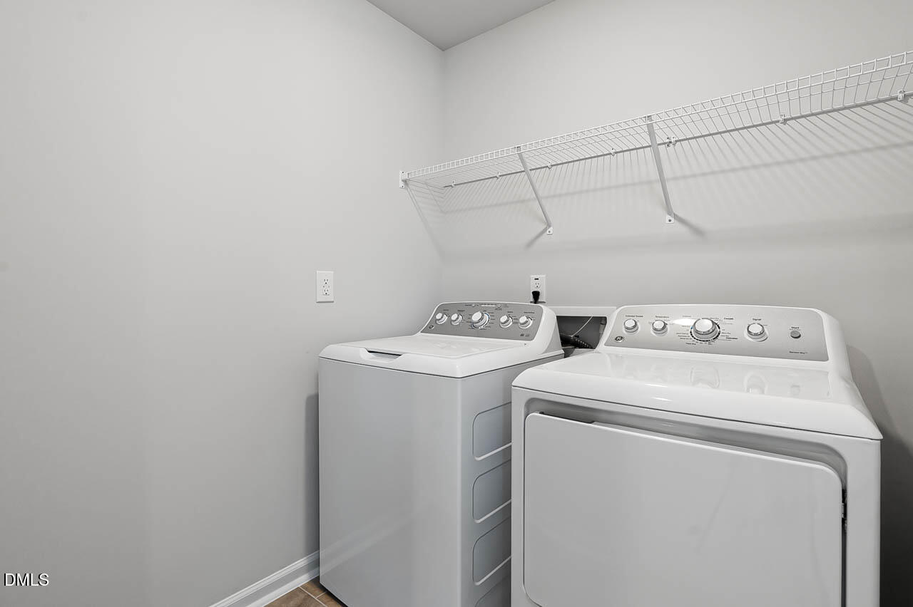 2421 Chert Lane Raleigh, NC 27610 - Photo 88 of 97 a utility room with dryer and washer