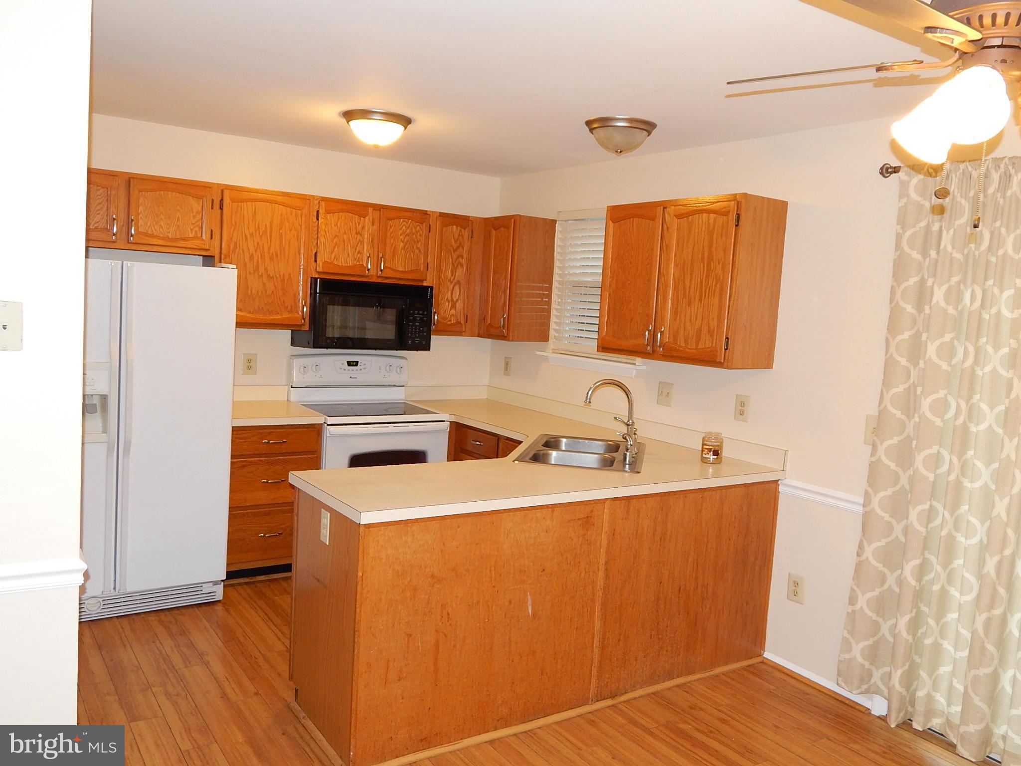8449 Spring Road Pasadena, MD 21122 - Photo 3 of 28 Kitchen