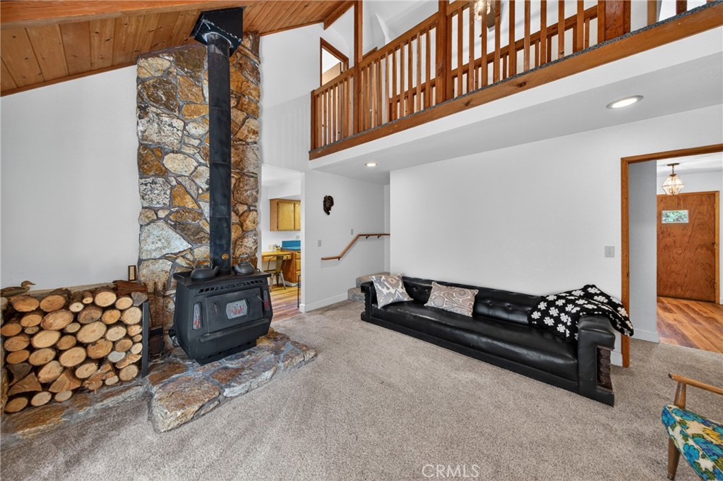 627 Cedar Canyon Road Lake Almanor, CA 96137 - Photo 19 of 34 a bedroom with furniture and a window