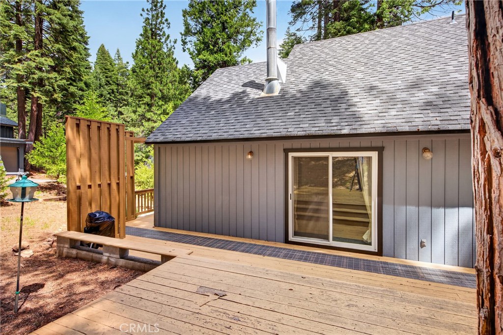 627 Cedar Canyon Road Lake Almanor, CA 96137 - Photo 27 of 34 a view of a house with a wooden fence