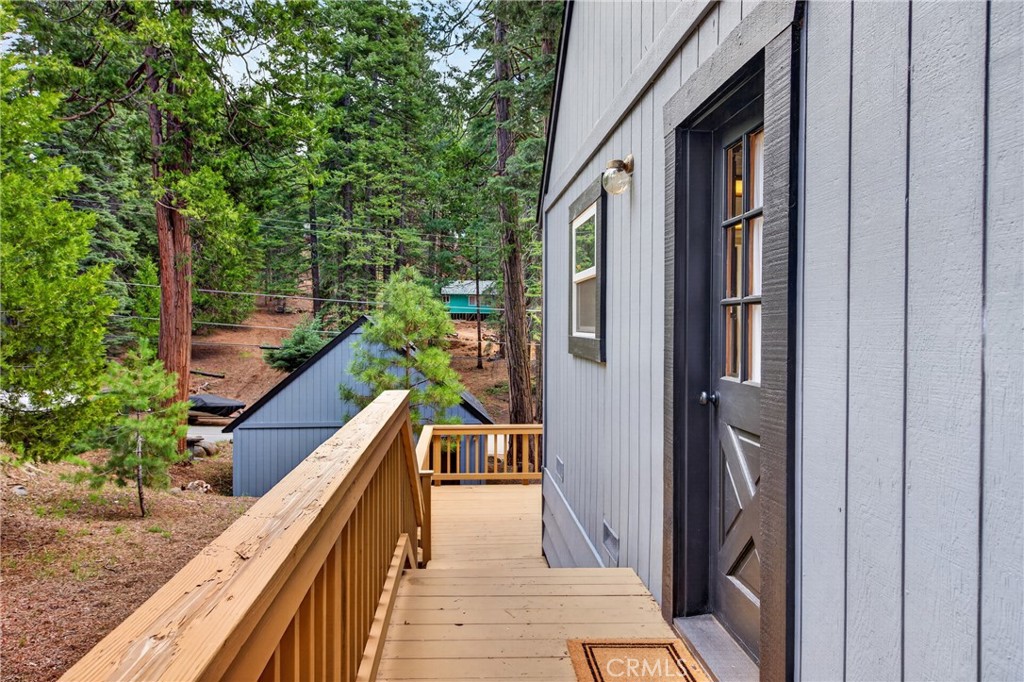 627 Cedar Canyon Road Lake Almanor, CA 96137 - Photo 30 of 34 a balcony with view of trees in the background