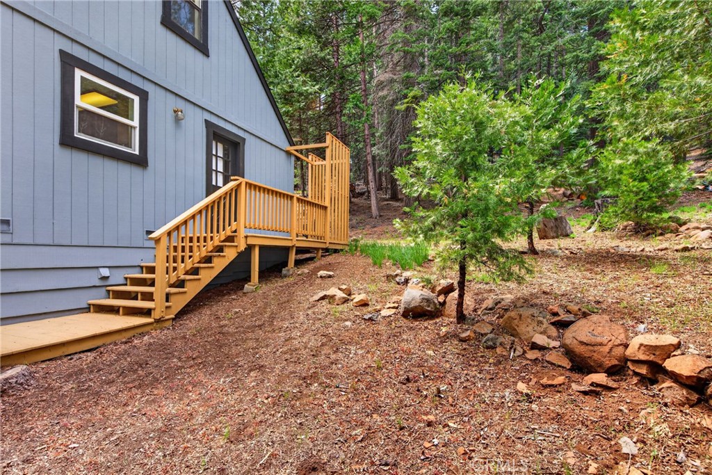 627 Cedar Canyon Road Lake Almanor, CA 96137 - Photo 32 of 34 a view of a house with a yard
