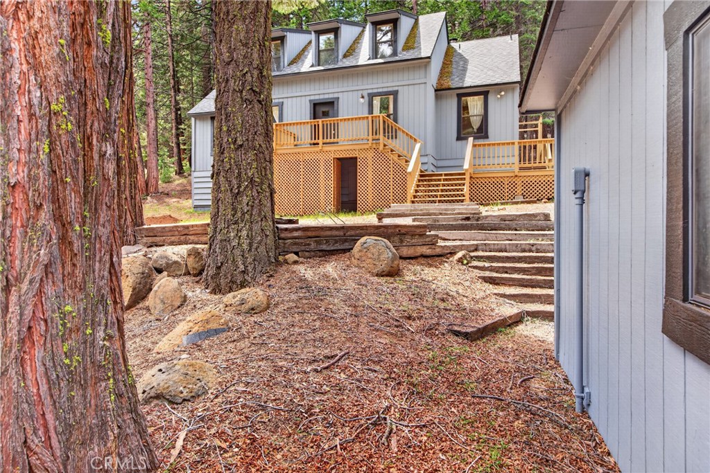 627 Cedar Canyon Road Lake Almanor, CA 96137 - Photo 34 of 34 a view of a house with backyard and wooden fence