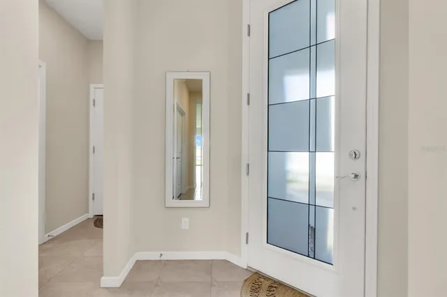 a bathroom with a shower and closet
